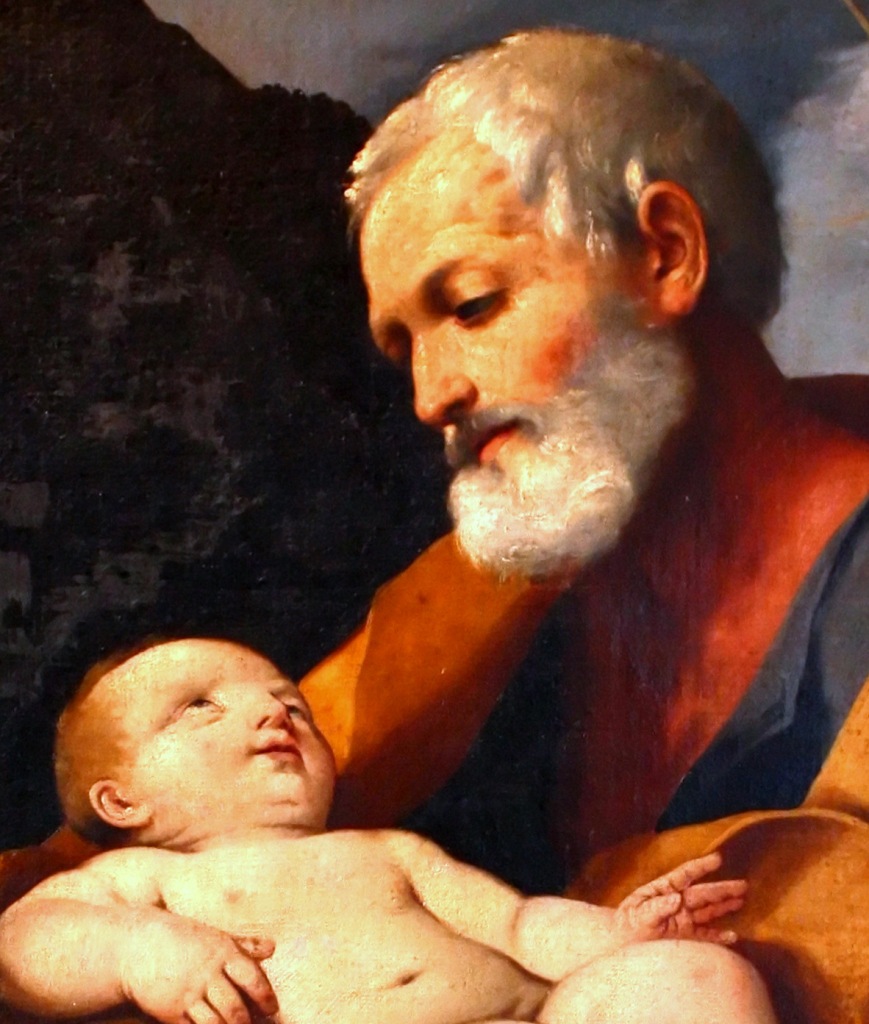 Regard tendre de Saint Joseph vers Jésus bébé